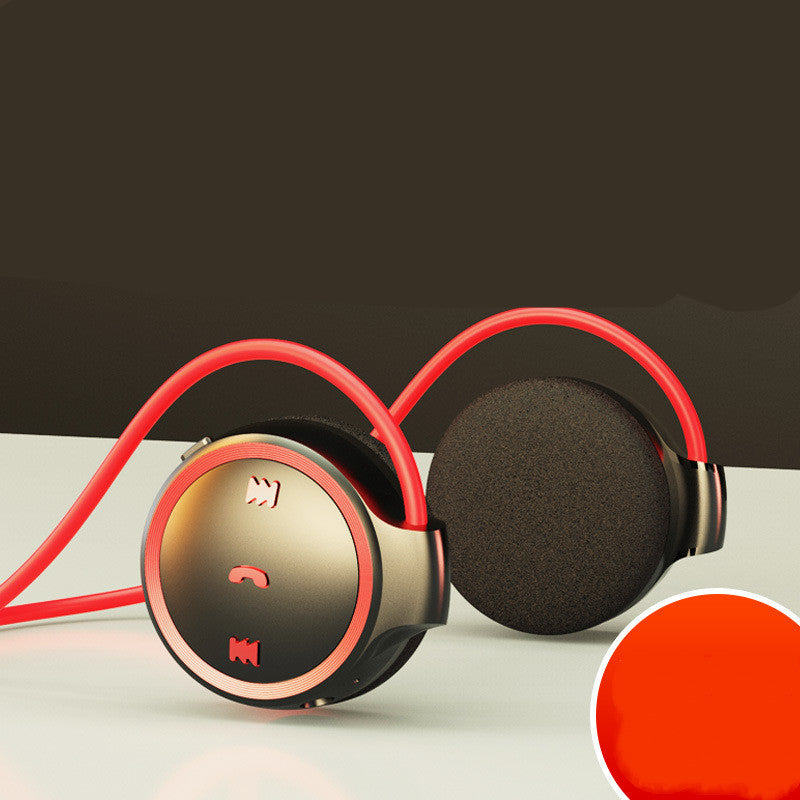 Red and black bone conduction Bluetooth headphones, left control dial visible
