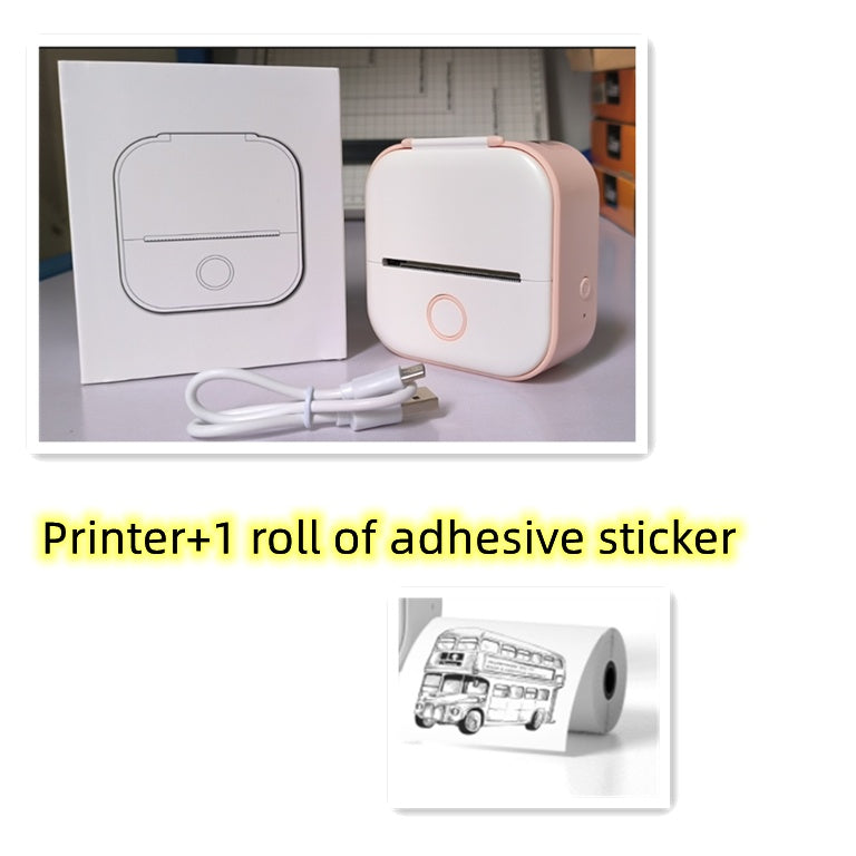 White portable mini thermal label printer with pink cable and adhesive sticker roll