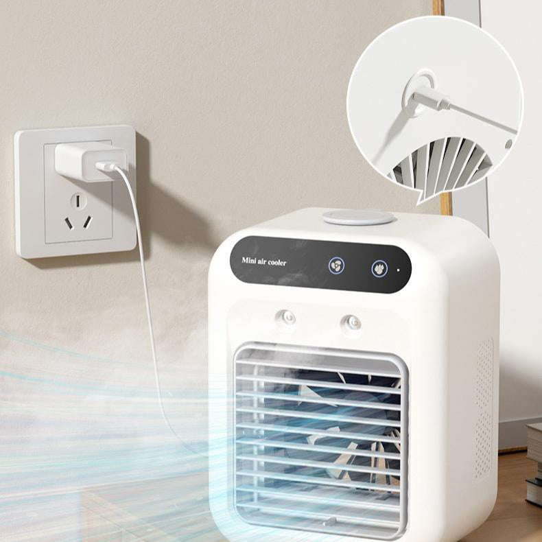 Portable mini air cooler with front grille and top controls, white body