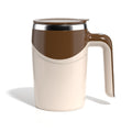 Brown and cream electric stirring cup with lid, front view and side handle