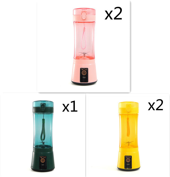 Portable electric fruit juicer set featuring pink, teal, and yellow cups