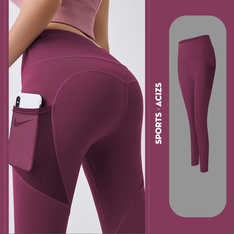Women’s yoga leggings with phone pocket, burgundy purple, high-rise back view.