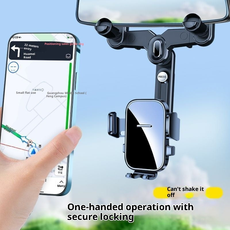 Black rearview mirror phone holder with phone in cradle and finger adjusting