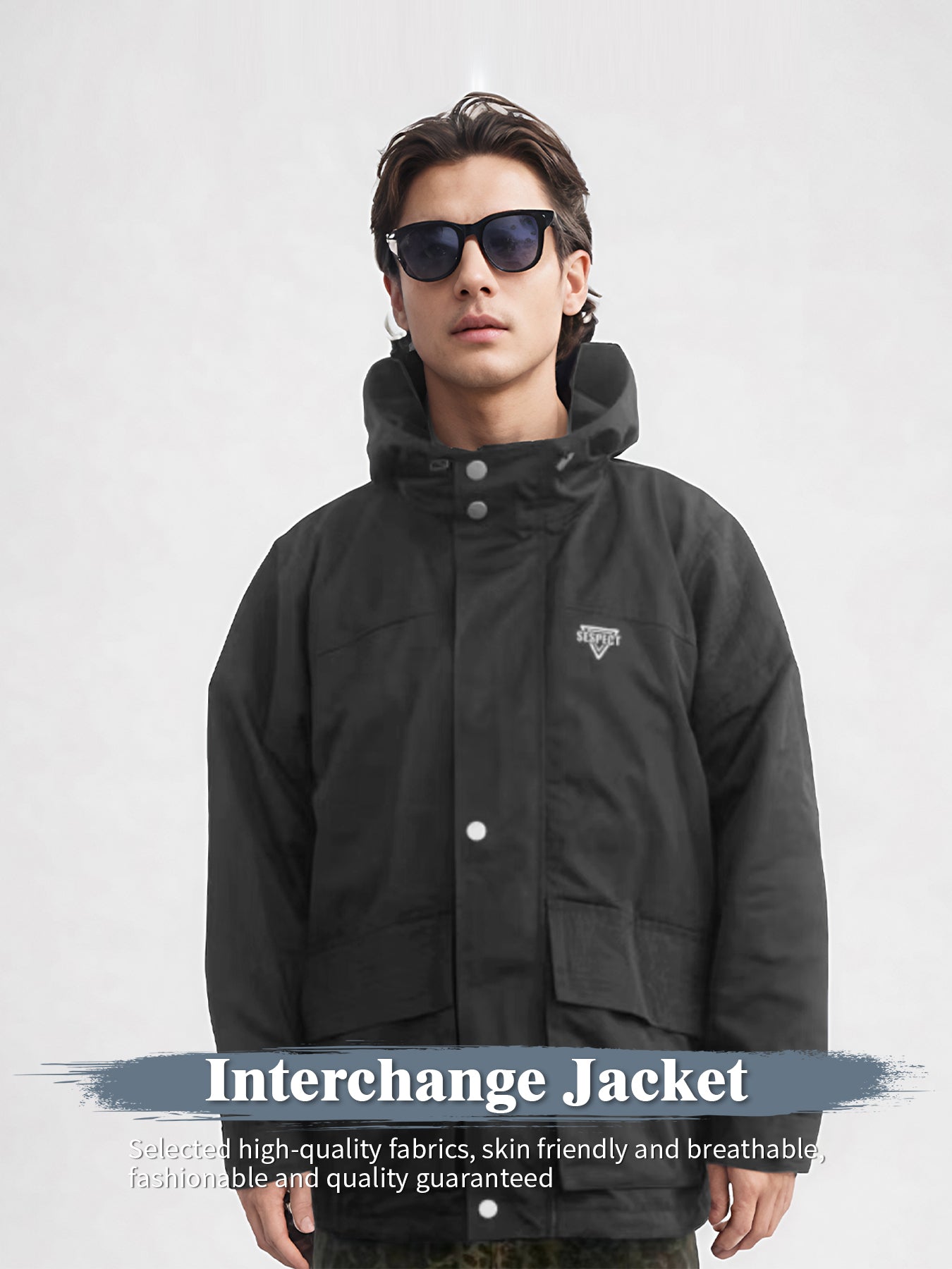 Black hooded rain jacket with front snap buttons and chest logo patch
