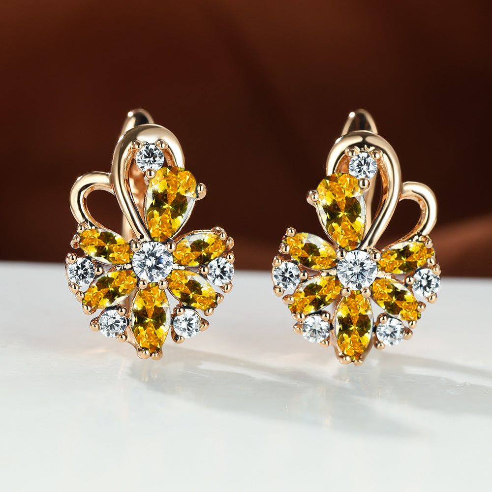 Gold flower drop zircon earrings with yellow and clear stones
