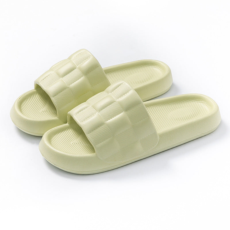 Women's EVA slide sandals in light green with checkered band straps and textured footbed