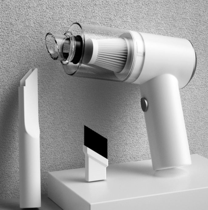 Wireless car vacuum cleaner with white handle and cylindrical dust cup on stand.