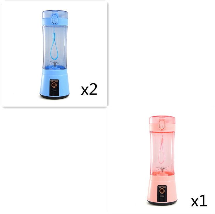 Portable electric fruit juicer blender with blue and pink translucent cups, black base