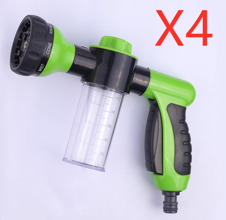 High-pressure foam spray gun with green body and black handle, clear cup and nozzle