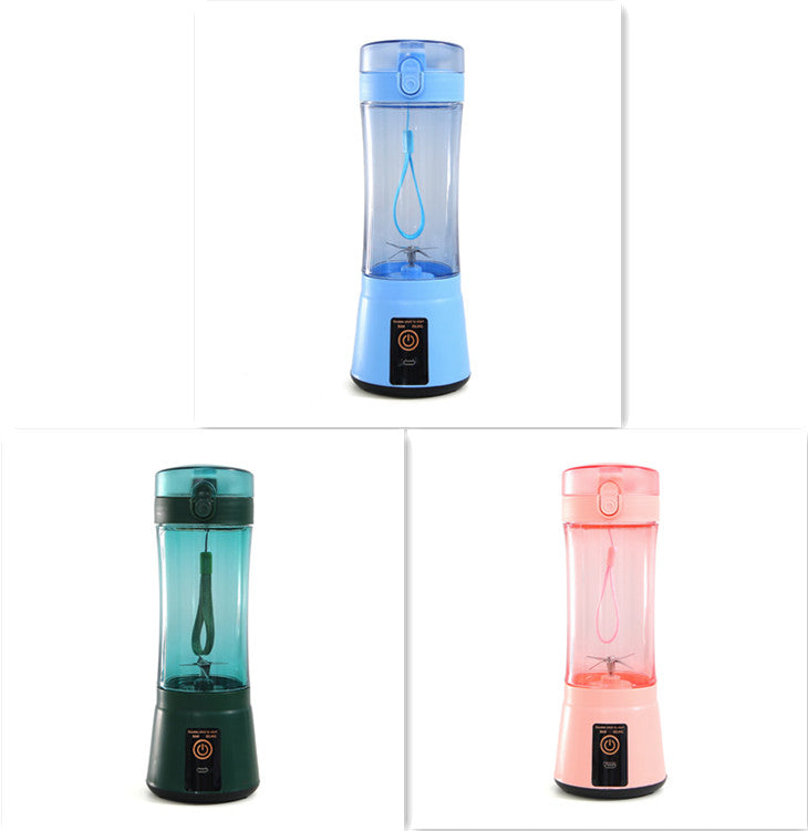 Portable electric fruit juicer blender with blue, dark green, and pink translucent cups, black bases