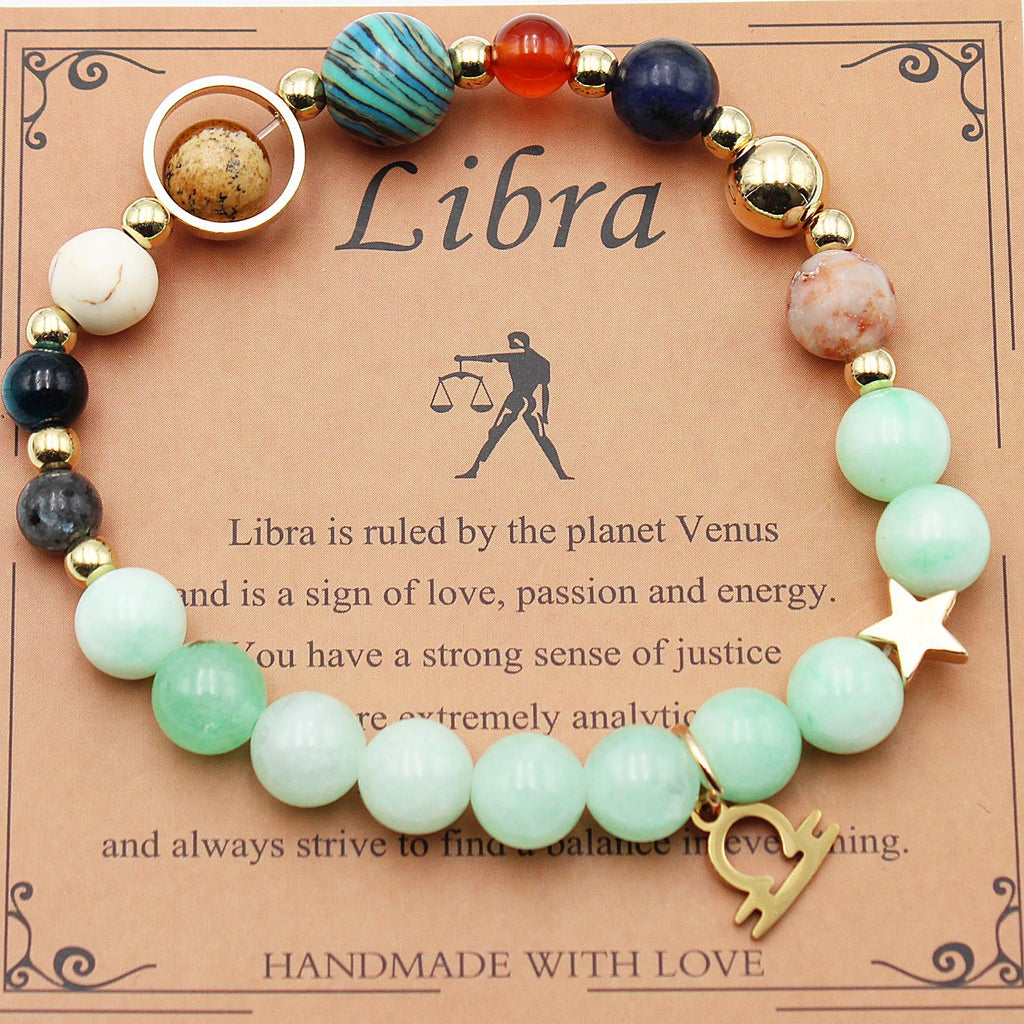 Beaded zodiac bracelet with mint green beads, gold spacers, star charm and blue accents