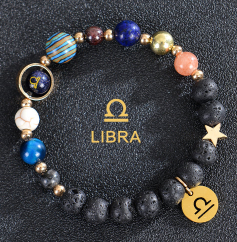 Zodiac bracelet with black lava beads and Libra charm, mixed stone beads.
