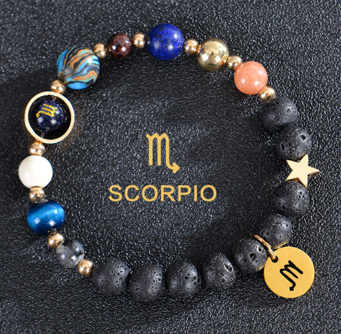 Zodiac bracelet with black lava beads and Scorpio charm, star accent charm.