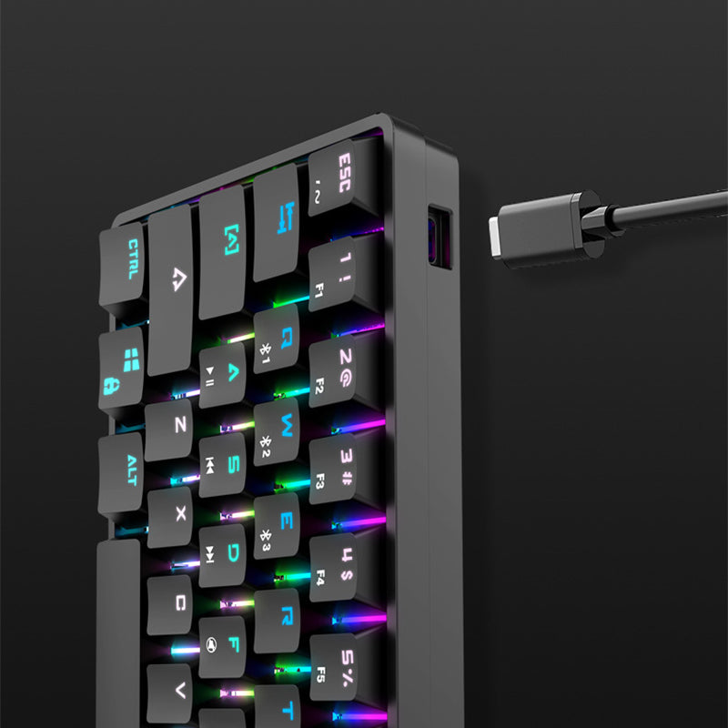 Mechanical keyboard side view with RGB backlit keycaps on a dark case.