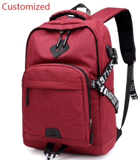 Red USB laptop backpack with front zip pocket, top handle, and padded shoulder straps