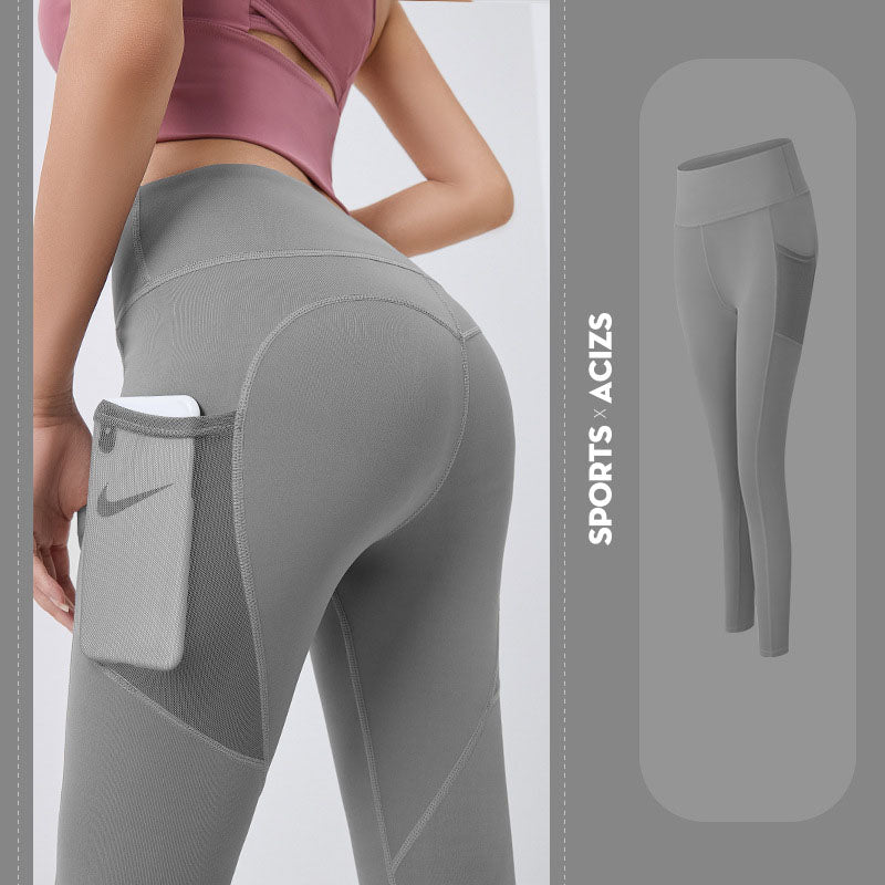 Women’s yoga leggings with phone pocket, light gray, high-rise back view.