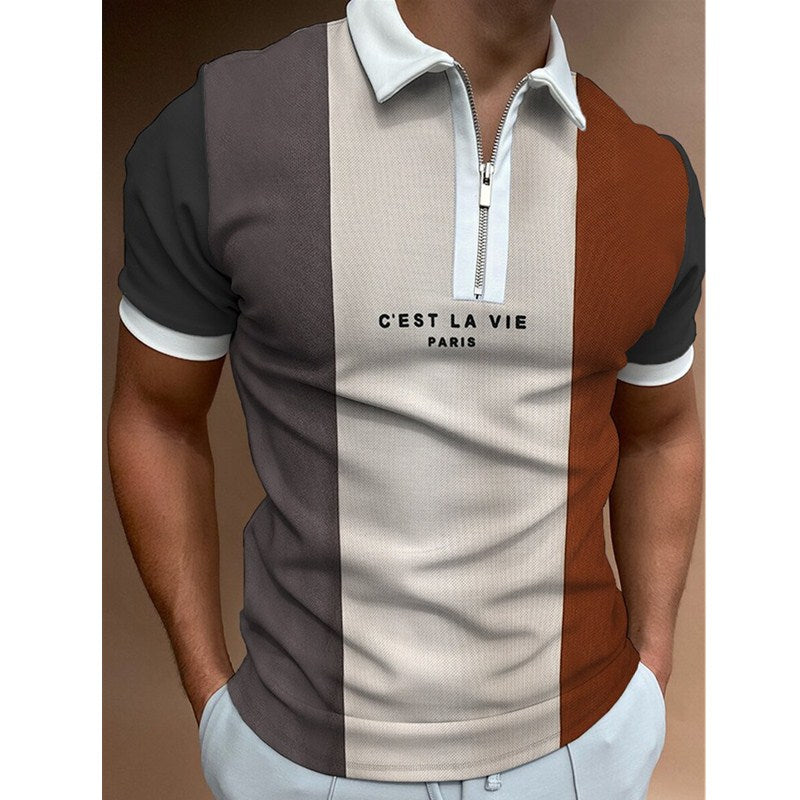 Men’s polo shirt with vertical blocks of charcoal, cream, and rust; short sleeves, zip neck.