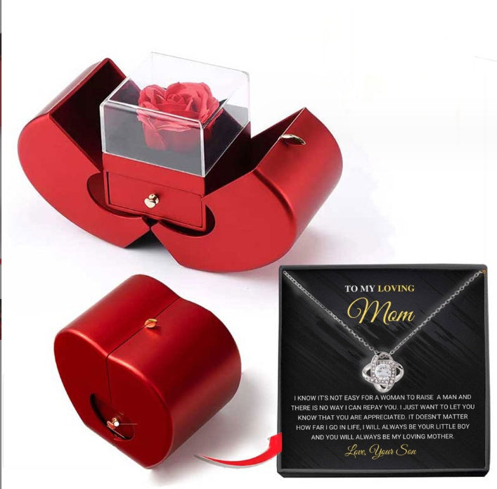 Red jewelry box with clear cover and red rose; red matching keepsake box shown
