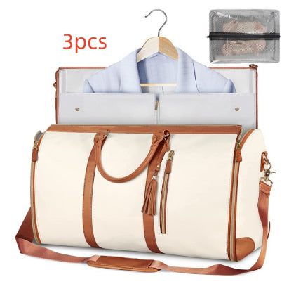 White travel duffle bag with brown accents, hanging garment organizer, zip pockets, shoulder strap