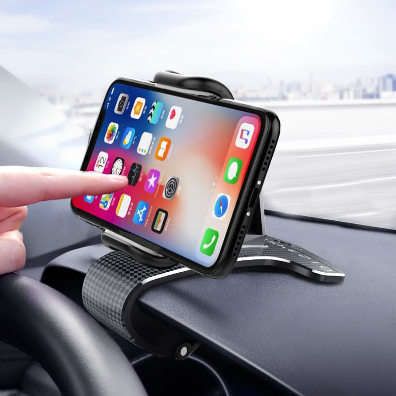 Snap-on car dashboard phone holder holding a smartphone, textured clip base