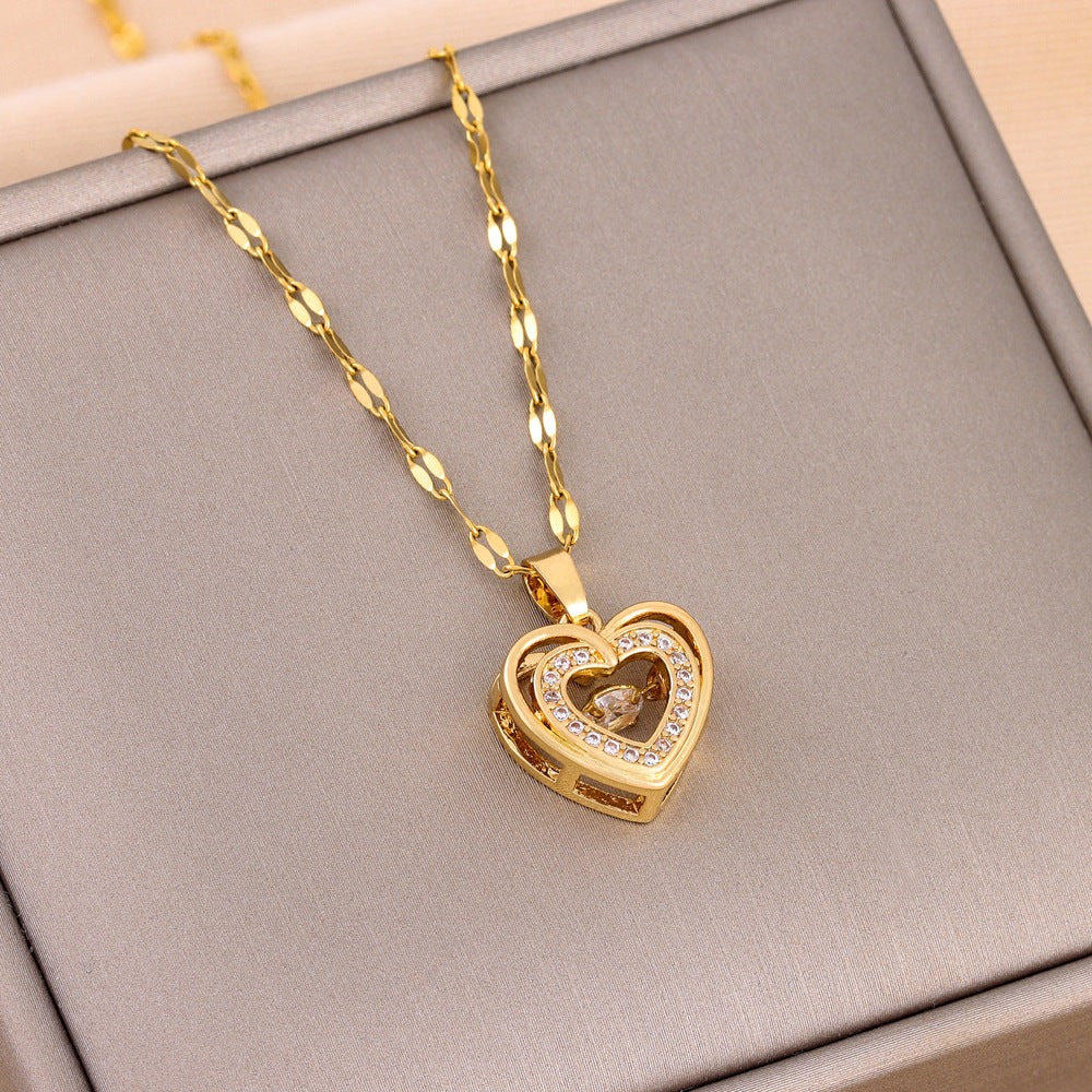 Gold-toned double-layer love necklace with heart charm and rhinestone border
