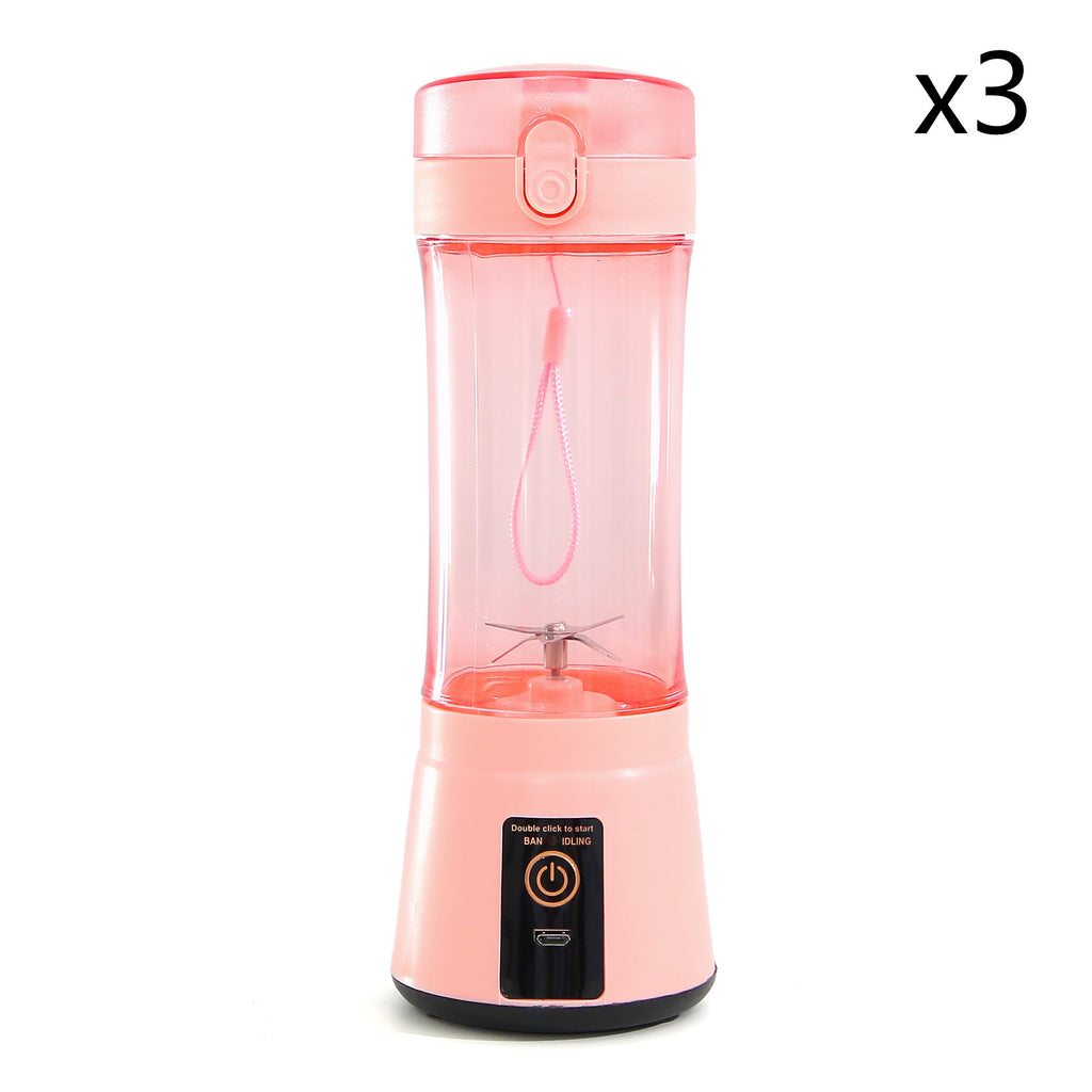 Pink portable electric fruit juicer blender with translucent cup and black control base