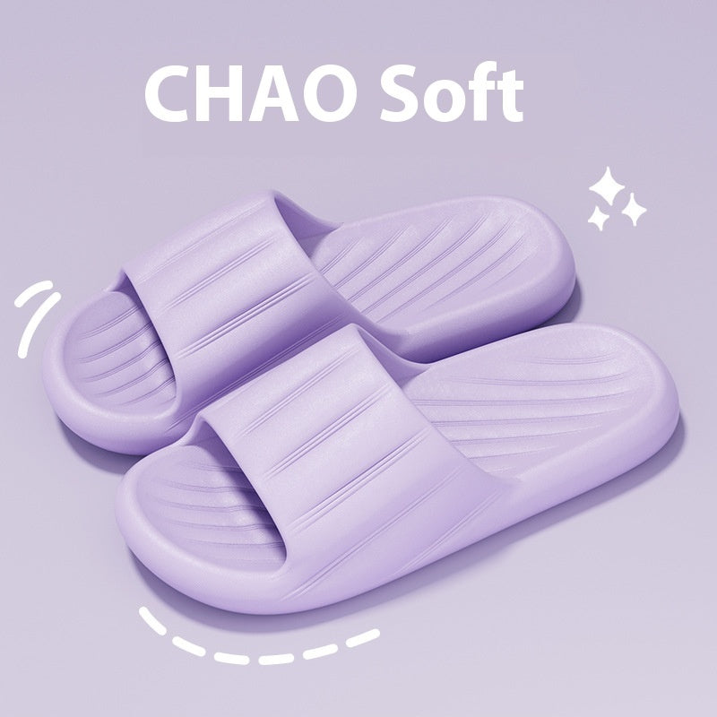 Purple slide slippers with striped strap and molded ribbed footbed