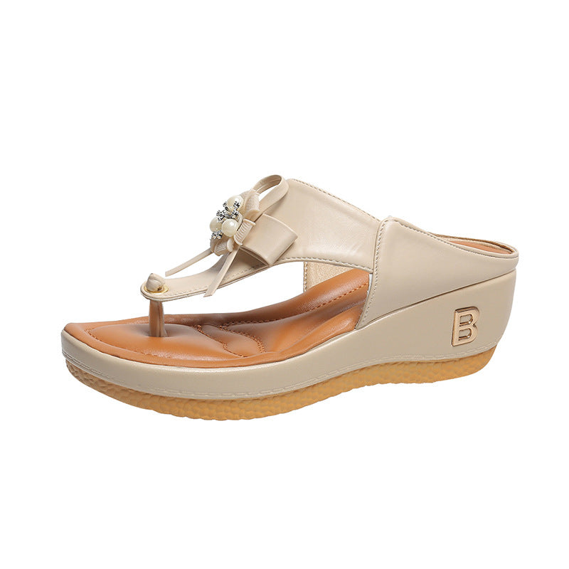 Women’s flower wedge platform flip flops in light beige with bow flower detail and wedge sole