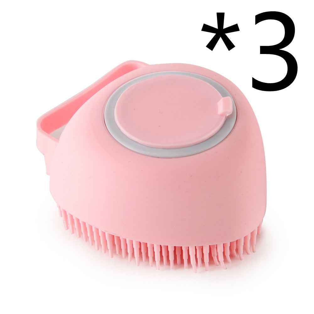 Pink silicone pet bath brush with circular lid and flexible bristles