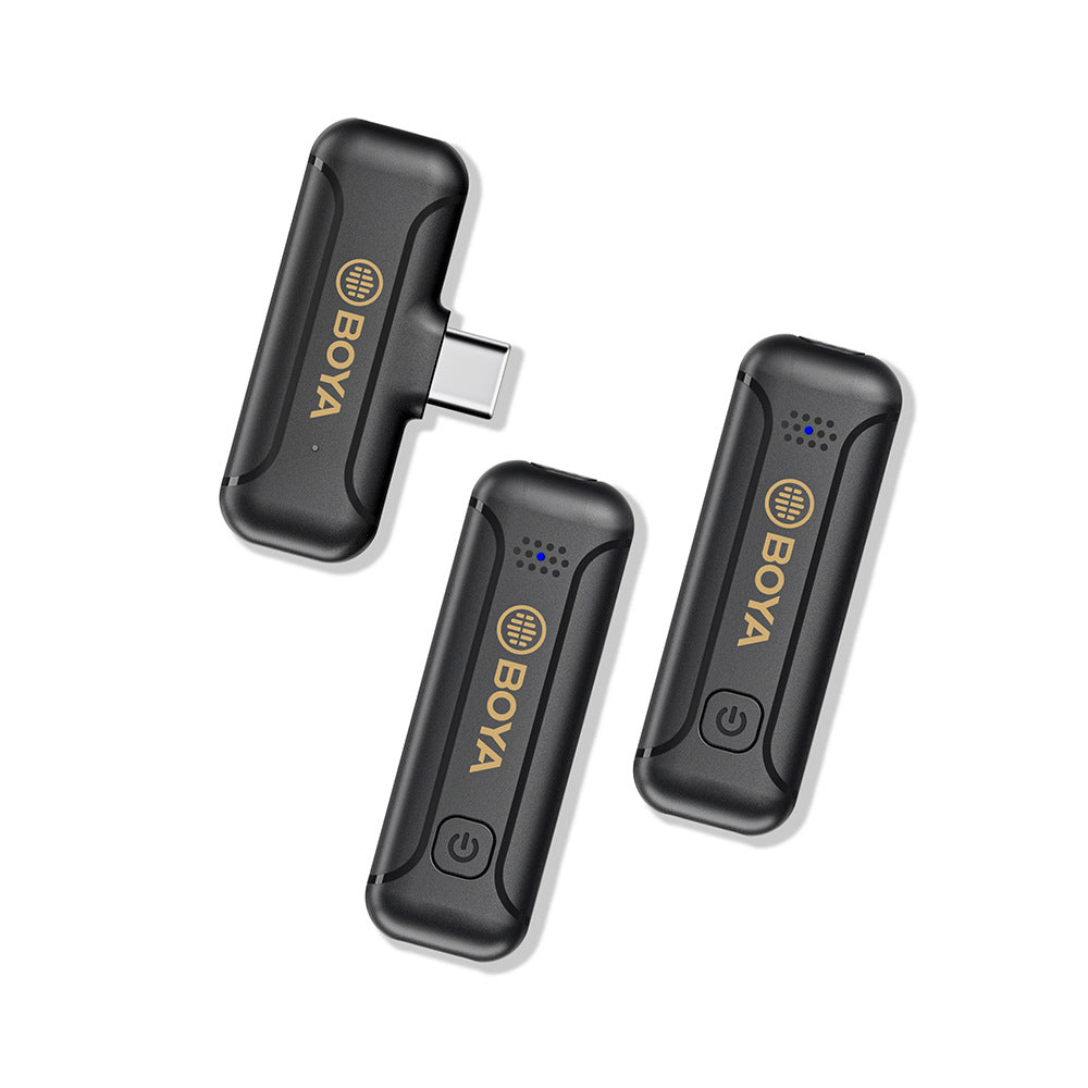 Black BOYA clip-on radio microphone transmitters with USB plugs