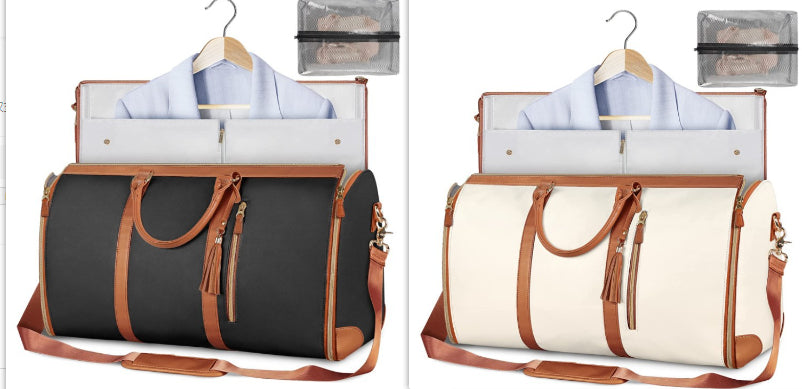 Pair of travel duffle bags: black with tan trim and light with brown trim, open garment organizers