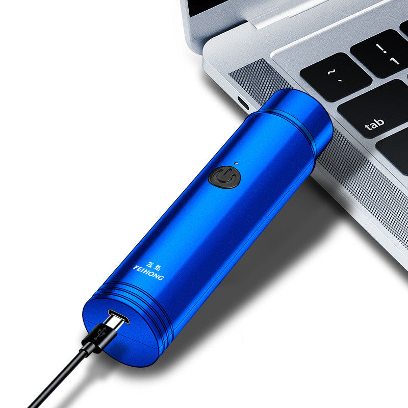 Blue portable electric mini shaver with USB charging cable connected.