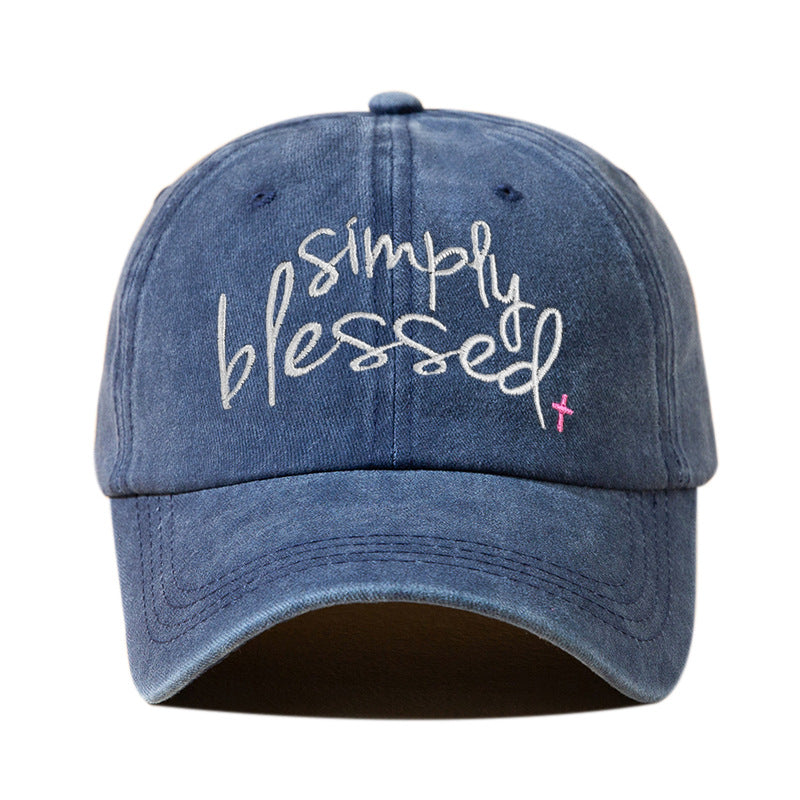 Blue denim washed baseball cap with embroidered "Simply Blessed" script