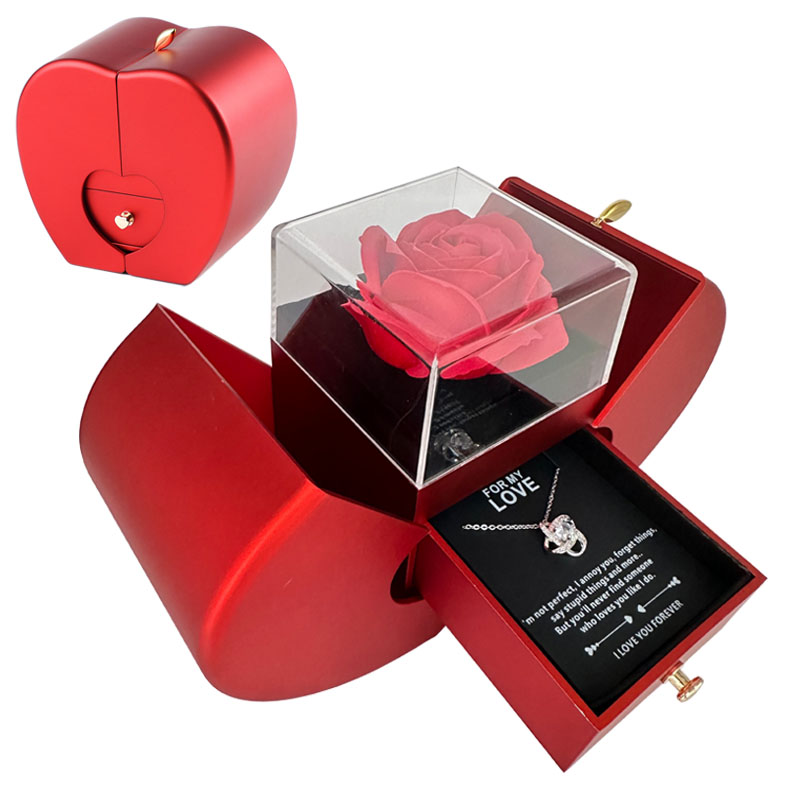Red heart-shaped jewelry box gift with glass rose top and necklace in open compartment