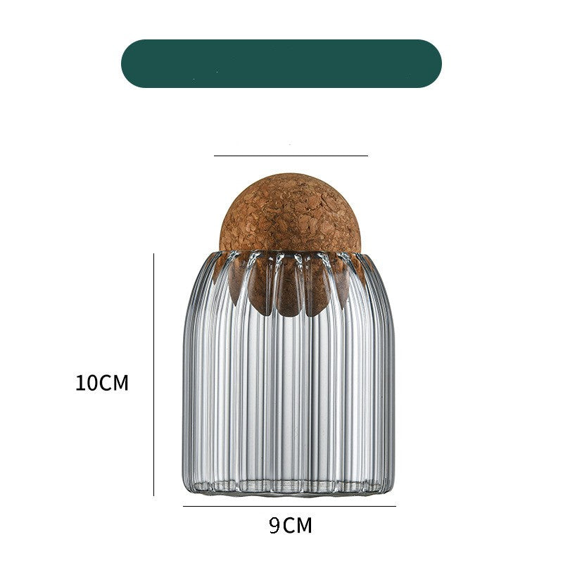 Ribbed glass display bottle with cork lid, 10cm tall and 9cm wide