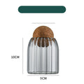 Ribbed glass display bottle with cork lid, 10cm tall and 9cm wide