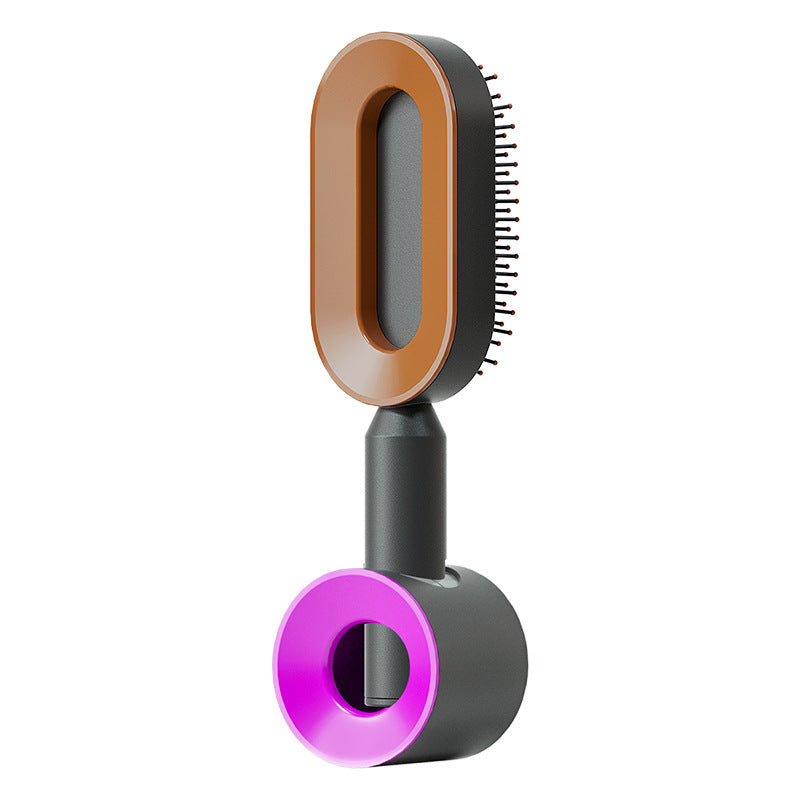 Self-cleaning hair brush with purple base, brown head insert, and dark handle