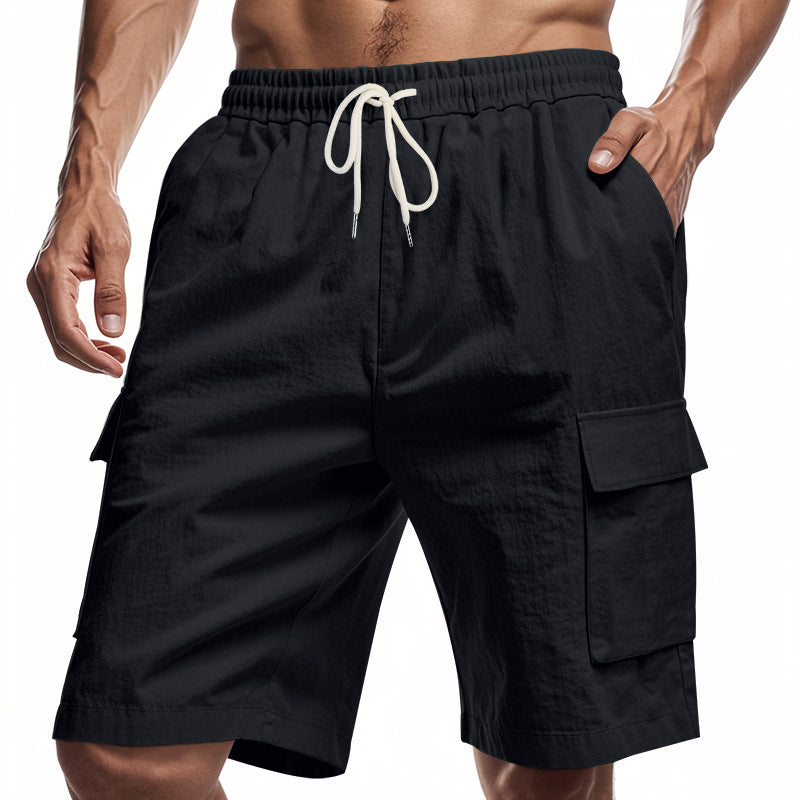 Black linen cargo shorts with elastic waistband and drawstring, side flap pockets