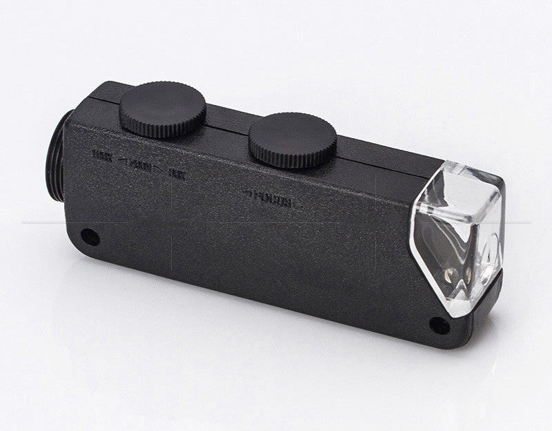Black clip-on microscope magnifier with two top knobs and clear front lens window
