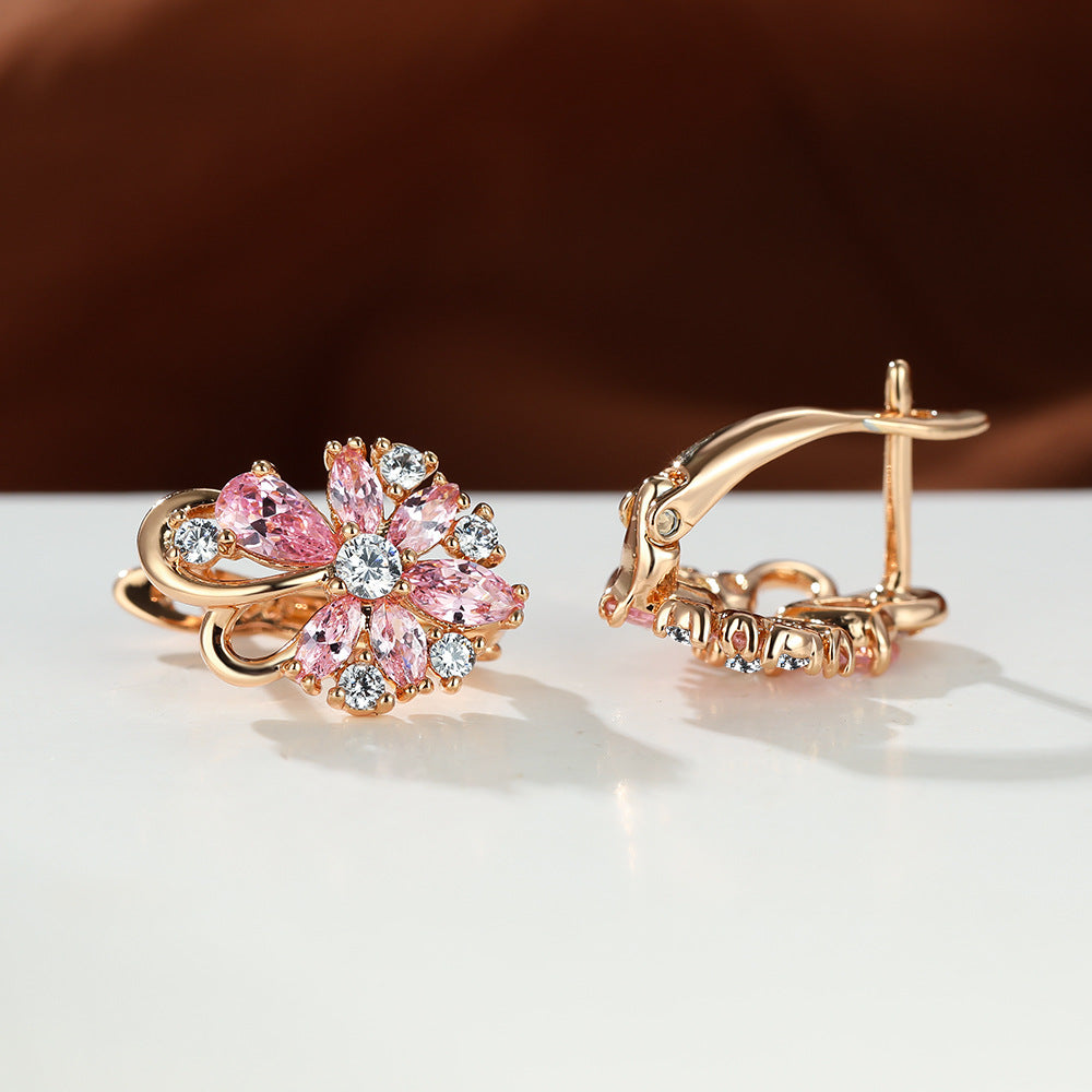 Flower drop-shaped zircon earrings with pink and clear stones in gold-tone settings