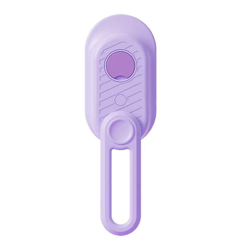Purple electric pet steam brush with rounded back panel, single button, and side handle.