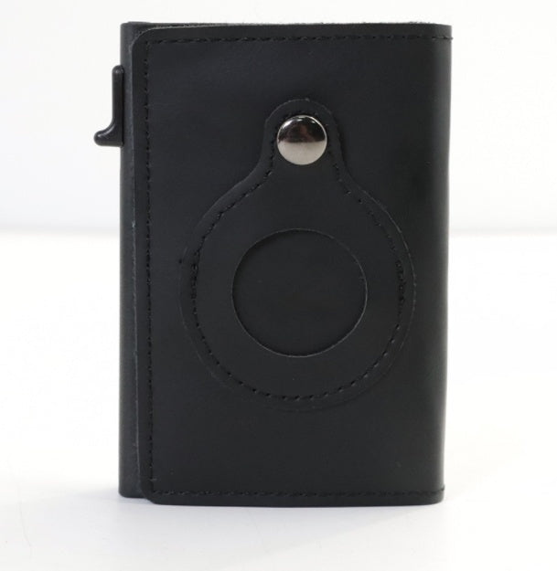 Black leather card wallet with circular AirTag cutout and metal snap button