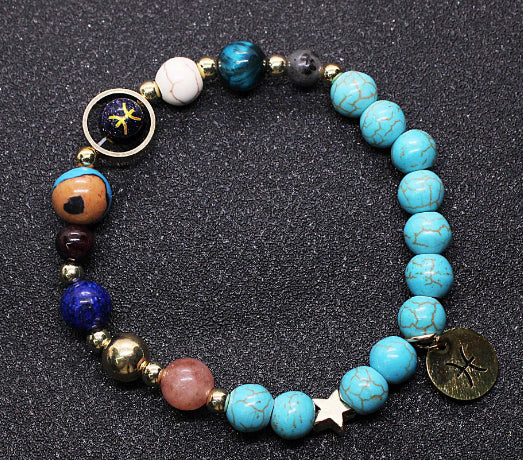 Turquoise beaded bracelet with mixed gemstone beads and zodiac charm medallions